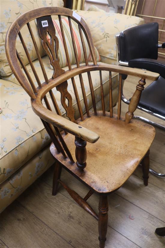 A 19th century ash and elm stick back elbow chair